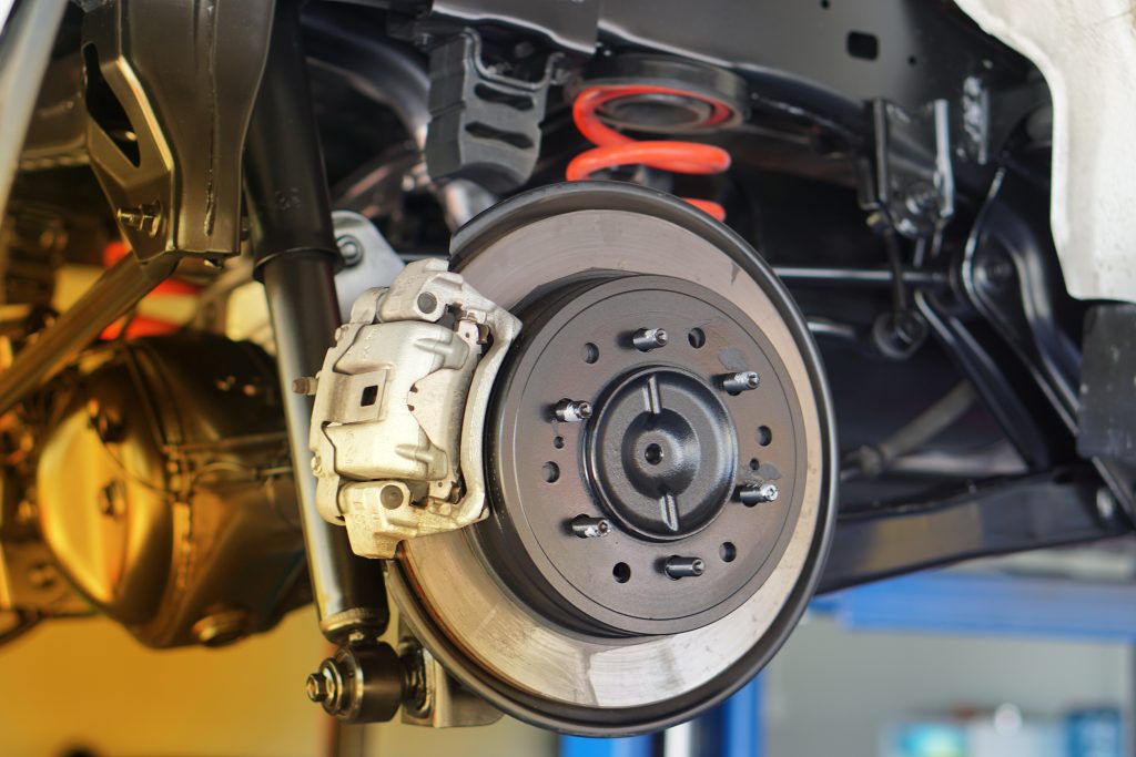 A photograph of new brakes installed on a car.